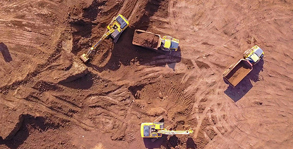 Erdbewegung auf Großbaustelle, IoT Smart Building