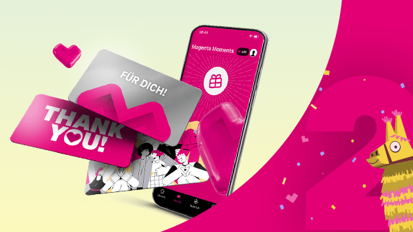 Smartphone mit Magenta Moments App und hervorgehobener Gutscheinkarte mit „Thank You“-Aufschrift sowie einer bunten Piñata.
