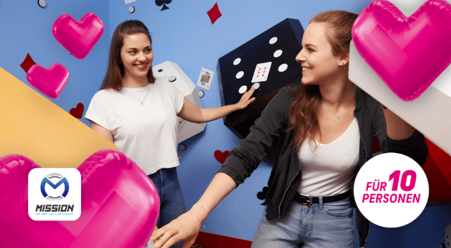 Zwei Frauen spielen in einer bunten Spielewelt; über Magenta Moments wird eine Party für 10 Personen bei Mission Games in Linz verlost.