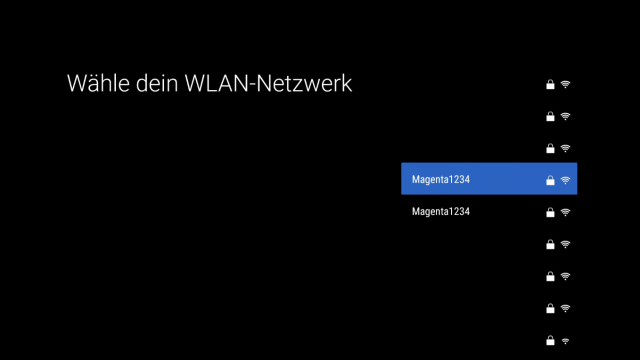 TV Box - WLAN Netz wählen Bildschirm zur WLAN-Auswahl auf der Magenta TV Box. Mehrere Netzwerke werden angezeigt. Das Netzwerk Magenta1234 ist markiert und zur Verbindung bereit.